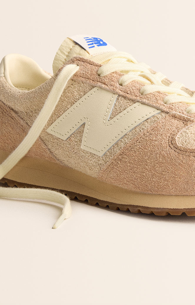 A close-up image of a tan 471 sneaker.