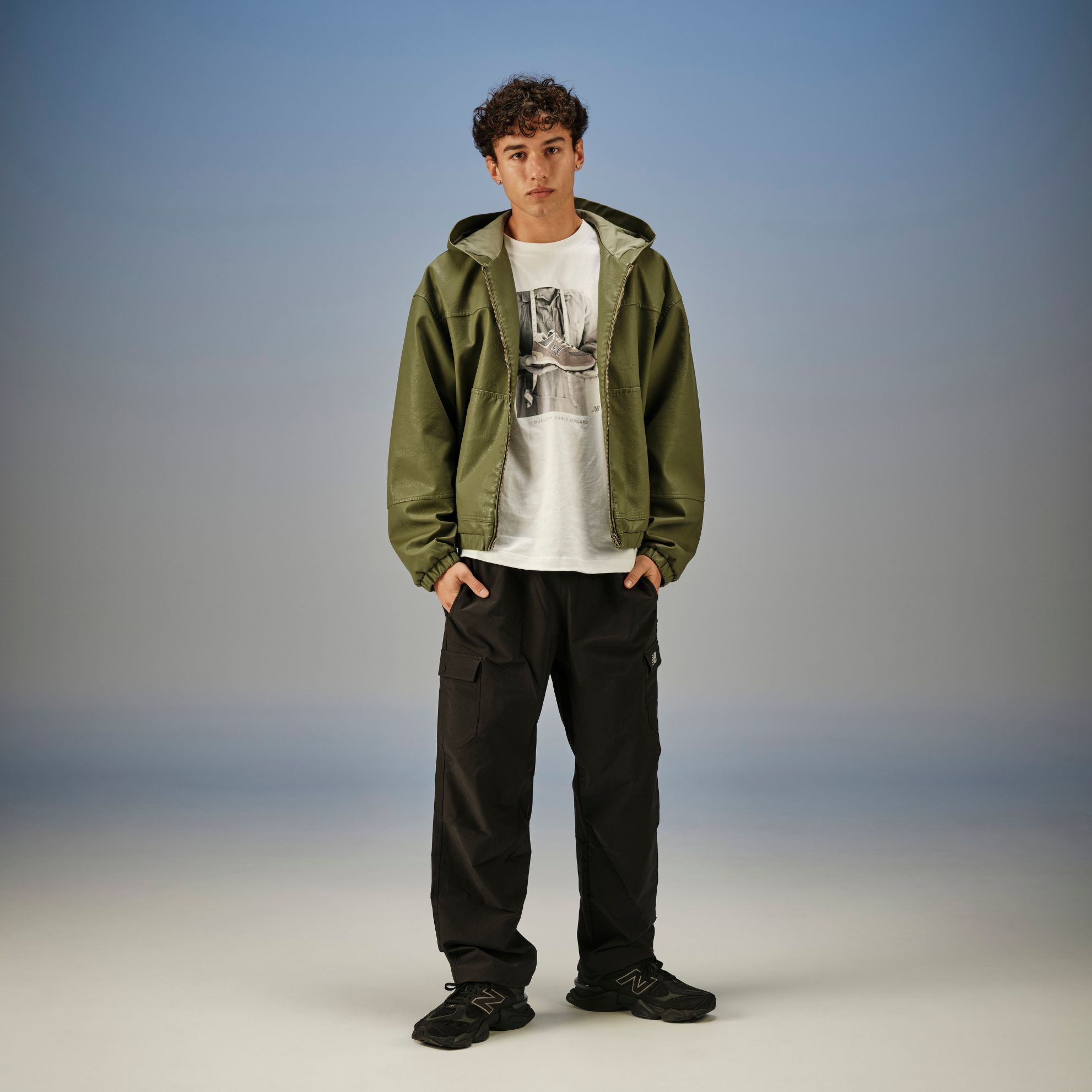 A man in studio wearing the New Balance 9060