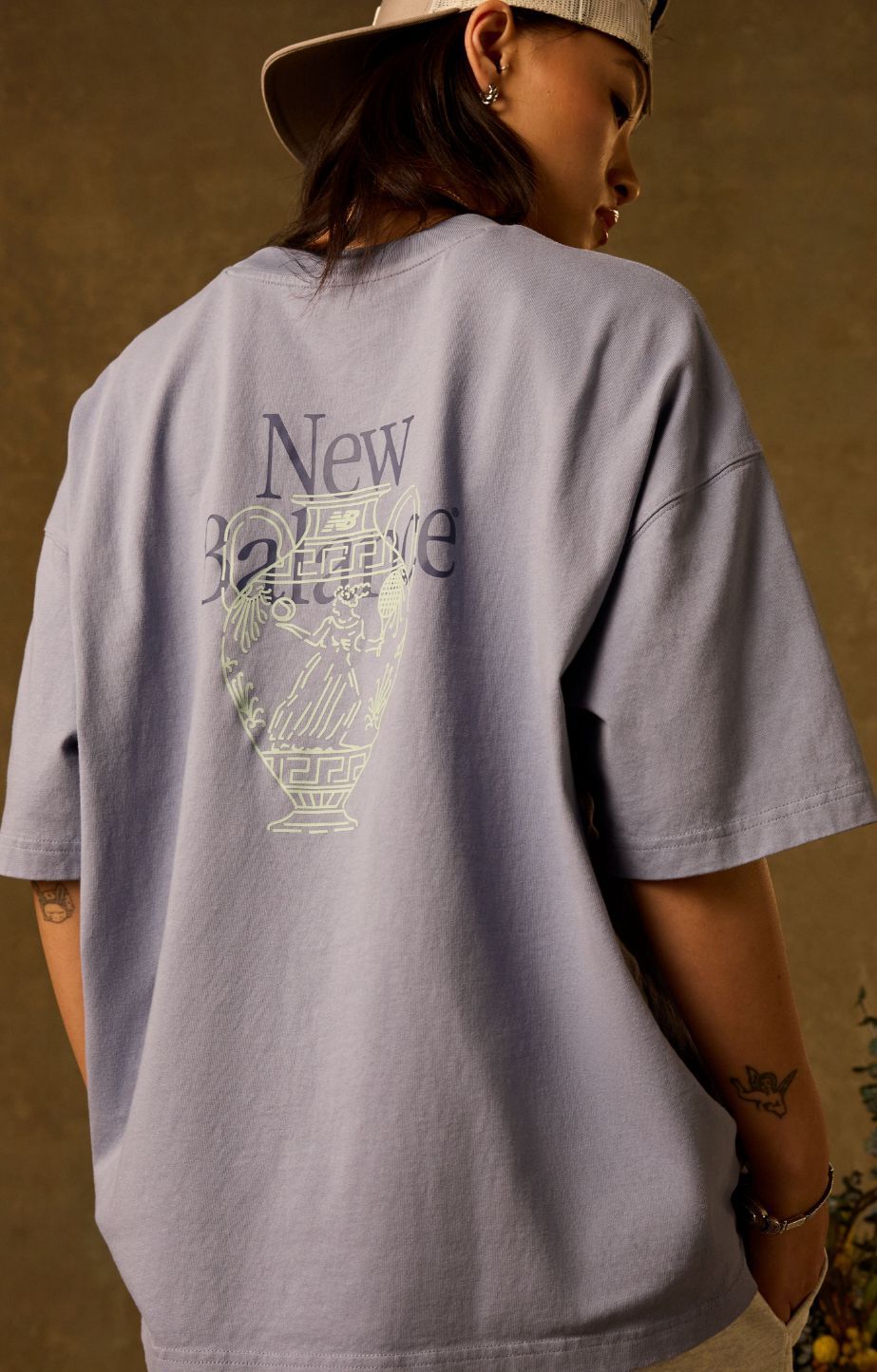 Close up of person wearing new balance apparel