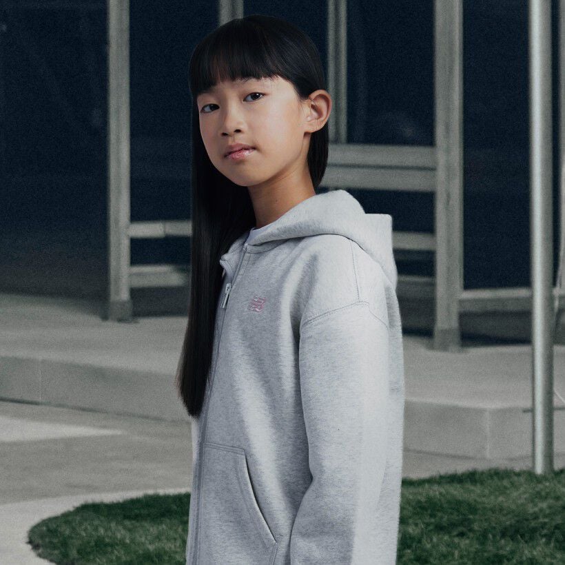 Girl wearing grey NB apparel