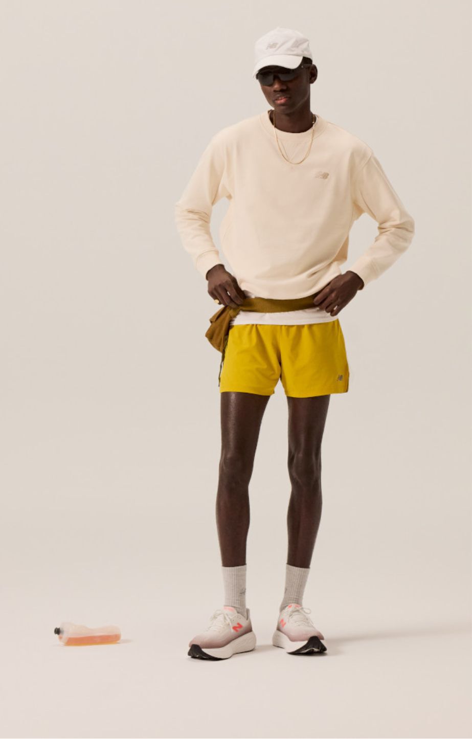 Man wearing a pair of new balance fresh foam x 1080 running shoes