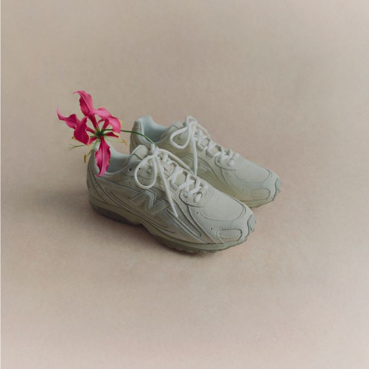 Still life studio shot of the 204L with red flower 