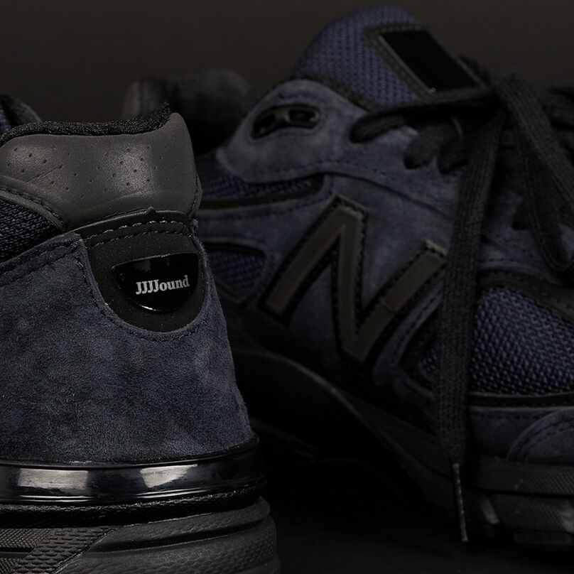 A pair of New Balance JJJJound's 990 shoes