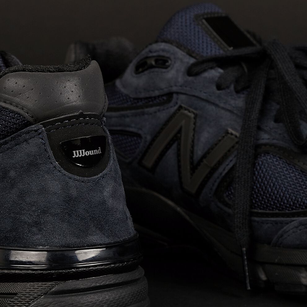 A pair of New Balance JJJJound's 990 shoes