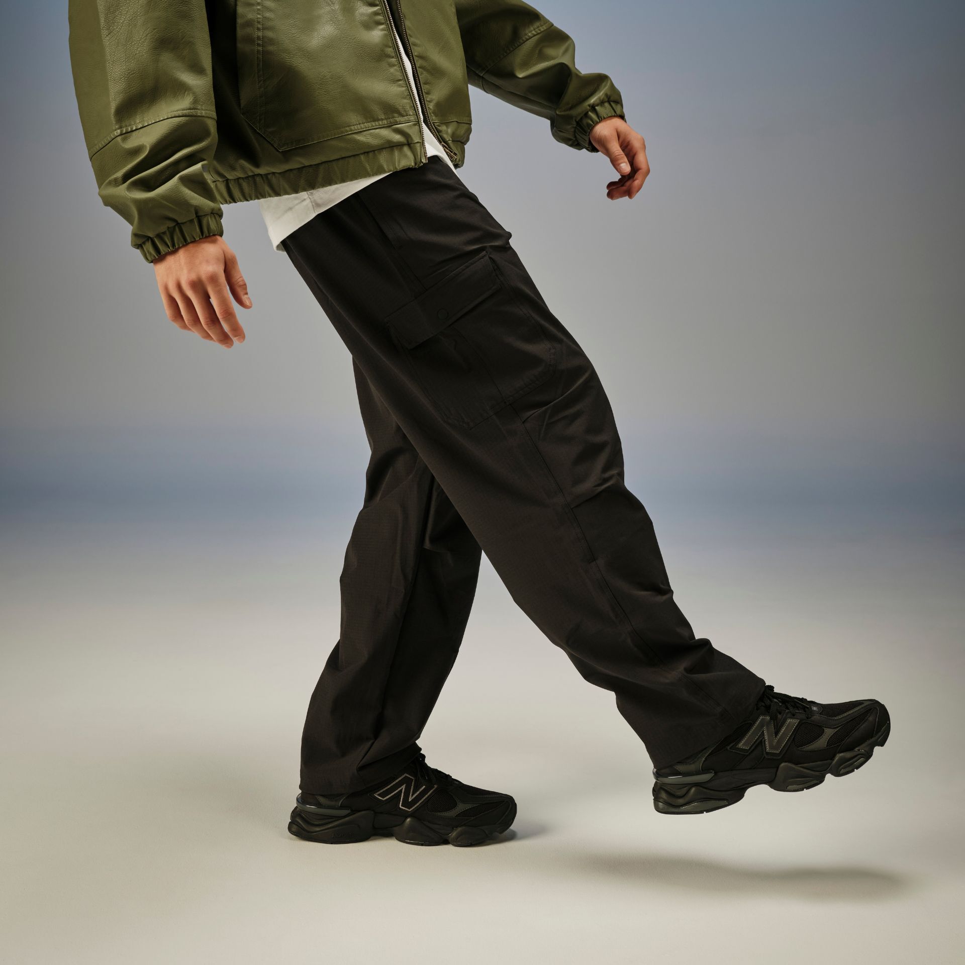 A man in studio wearing the New Balance 9060