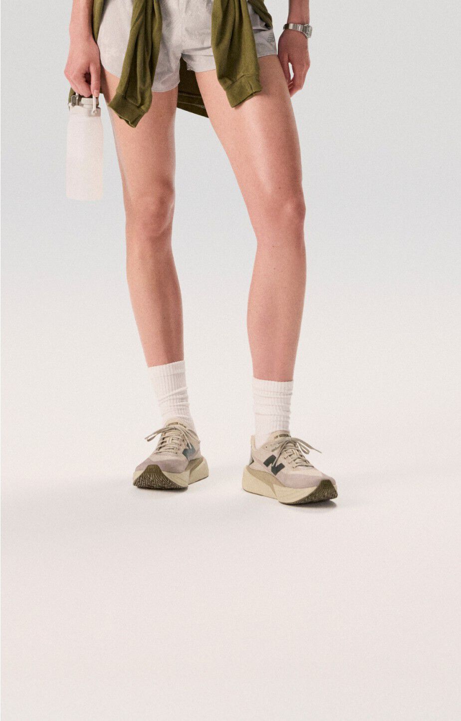 Woman wearing new balance fuelcell rebel v5s