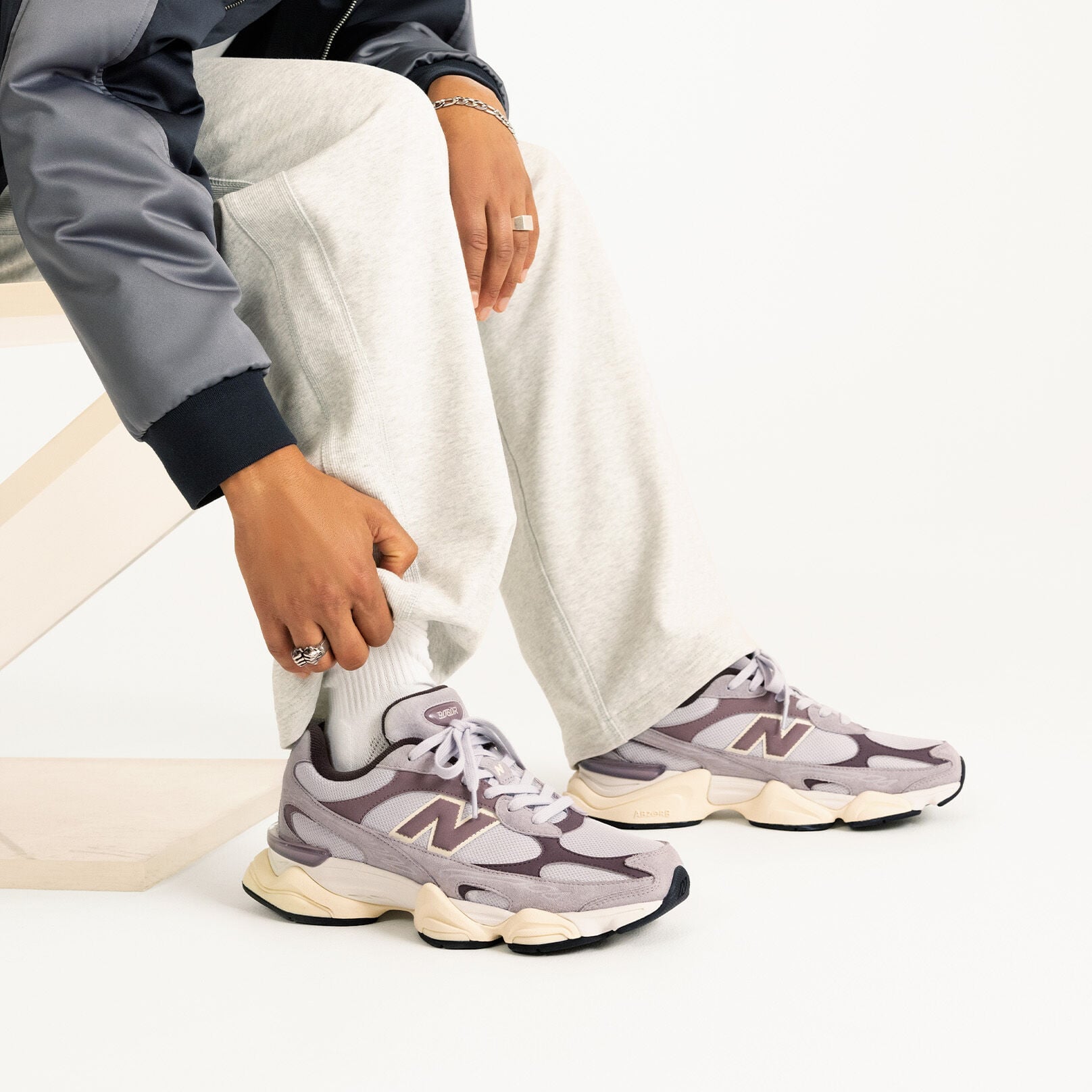 Man wearing the new Crimson Fog 9060 sneakers