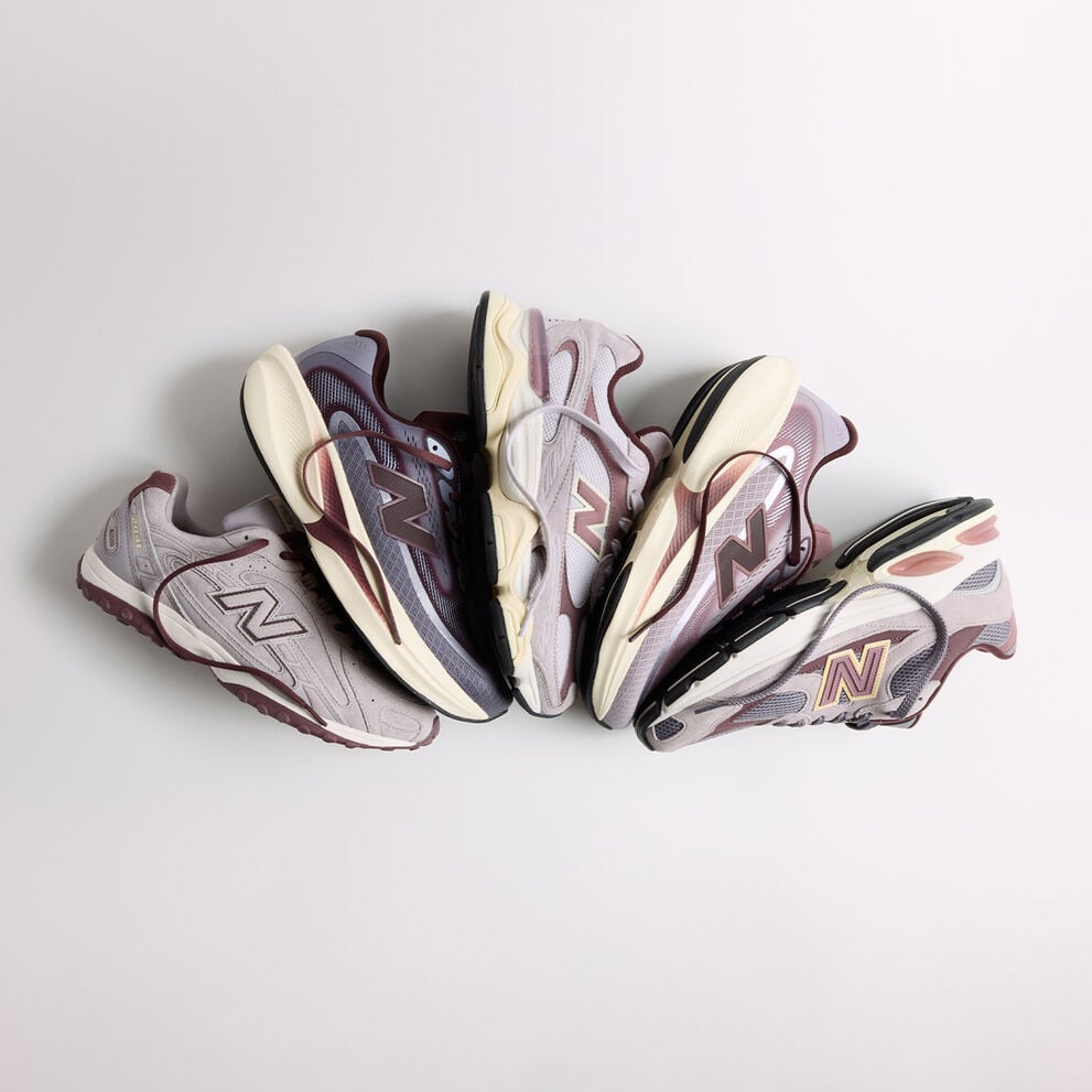 The Crimson Fog Pack laying fanned out on a grey background